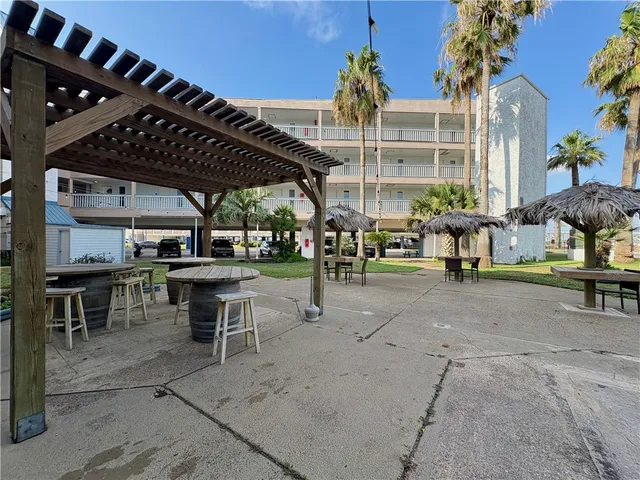 a front view of building with yard