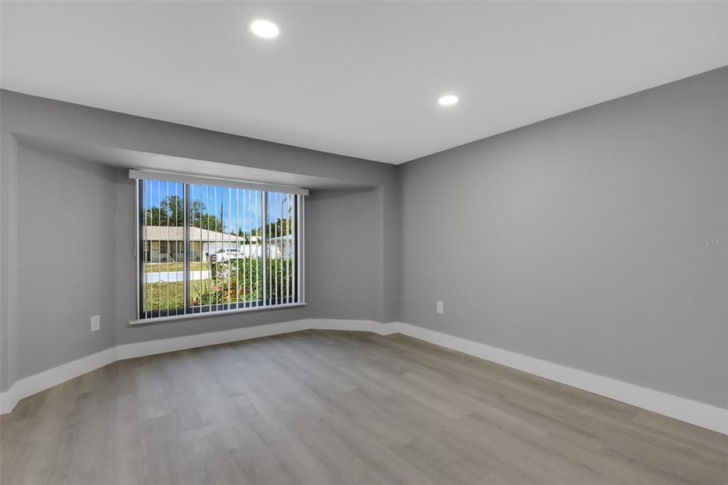 4645 Hunter Ridge Drive Sarasota, FL 34233 - Photo 15 of 70 a view of an empty room with a window