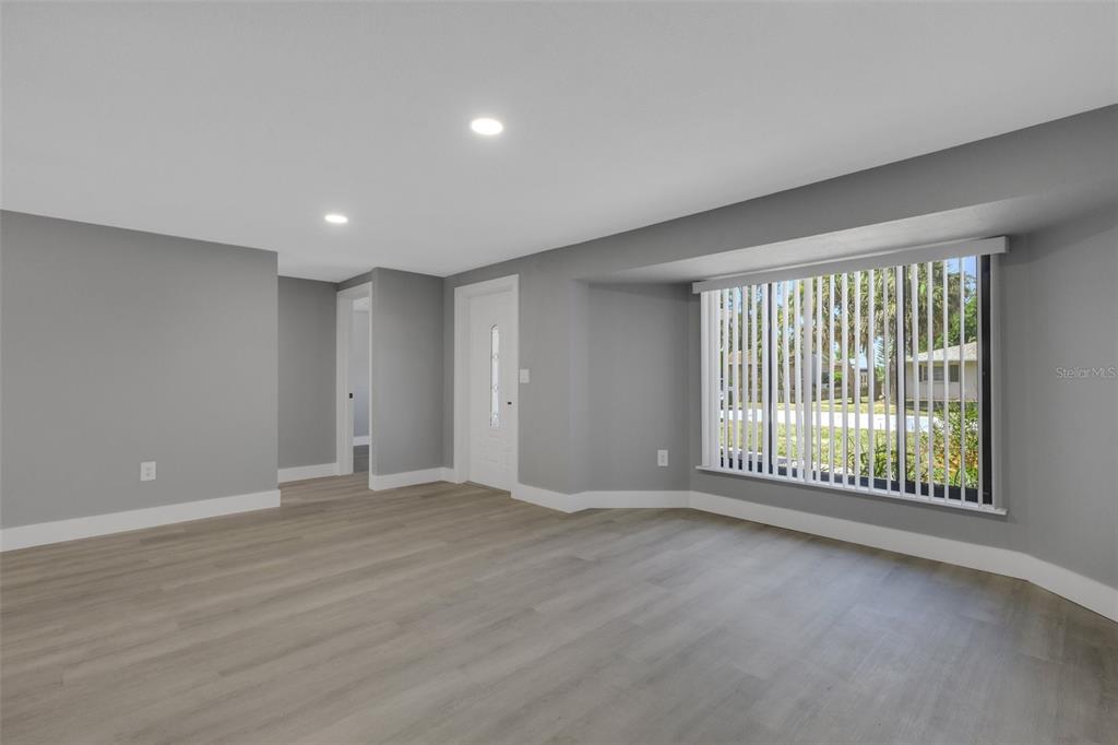 4645 Hunter Ridge Drive Sarasota, FL 34233 - Photo 16 of 70 a view of an empty room with a window