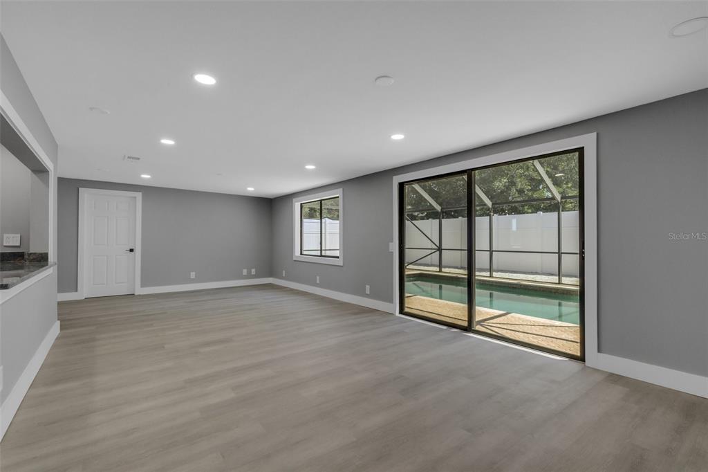 4645 Hunter Ridge Drive Sarasota, FL 34233 - Photo 38 of 70 a view of an empty room with a window
