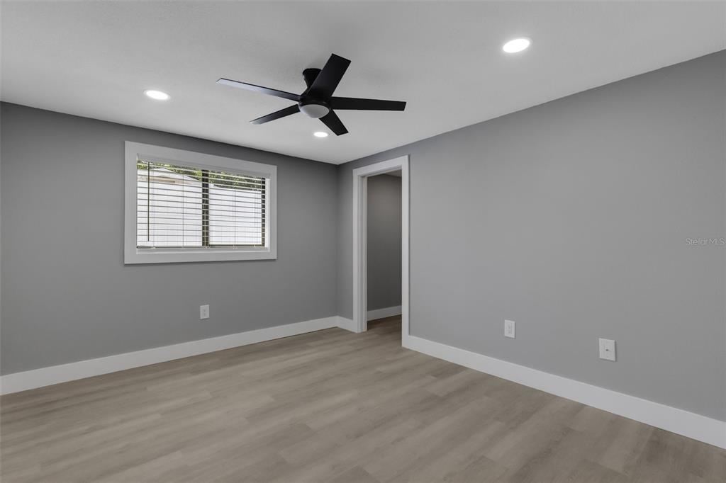 4645 Hunter Ridge Drive Sarasota, FL 34233 - Photo 47 of 70 a view of an empty room with a window