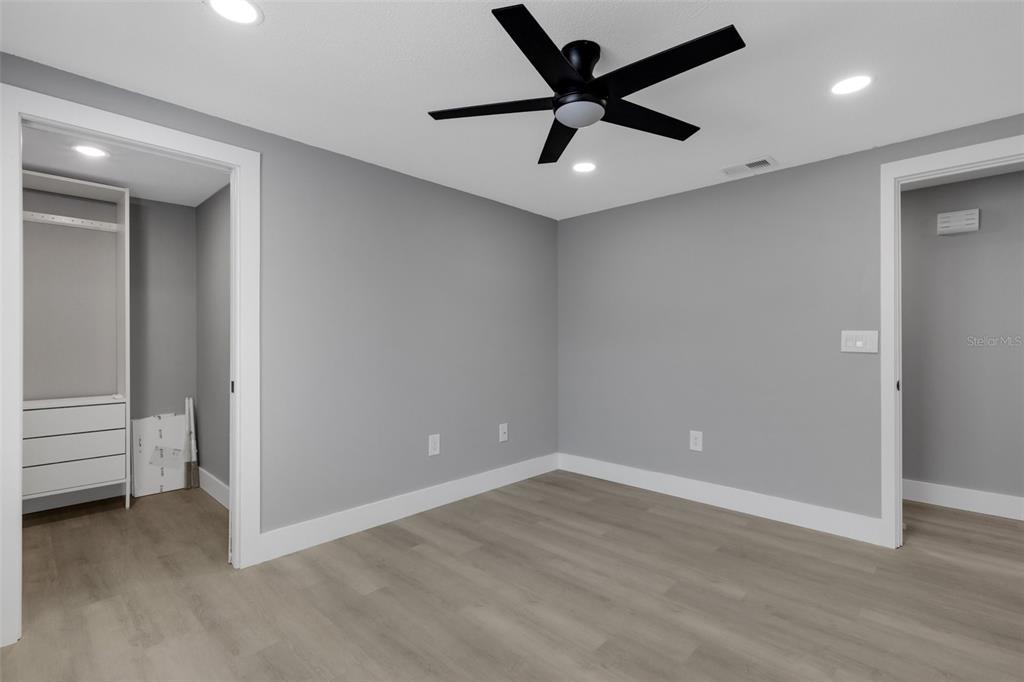 4645 Hunter Ridge Drive Sarasota, FL 34233 - Photo 48 of 70 wooden floor in an empty room