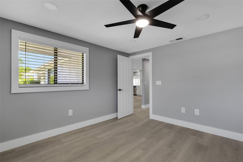 4645 Hunter Ridge Drive Sarasota, FL 34233 - Photo 53 of 70 a view of an empty room with a window