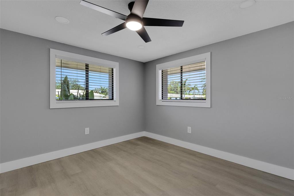 4645 Hunter Ridge Drive Sarasota, FL 34233 - Photo 54 of 70 a view of an empty room with a window