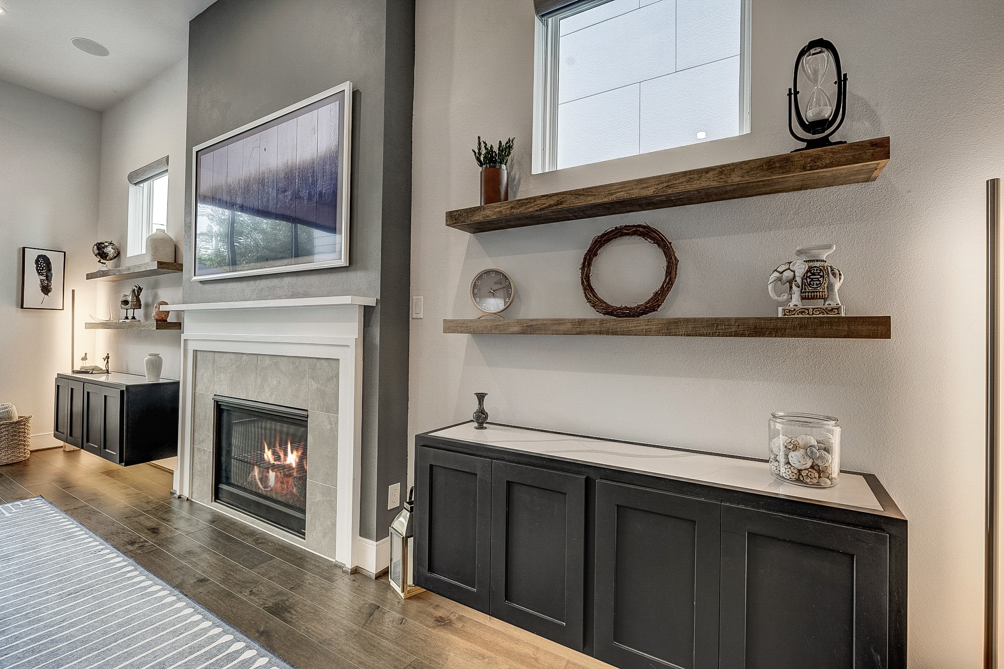 3306 Cardinal Crest Lane Houston, TX 77080 - Photo 13 of 50 a hallway with a fireplace and a mirror