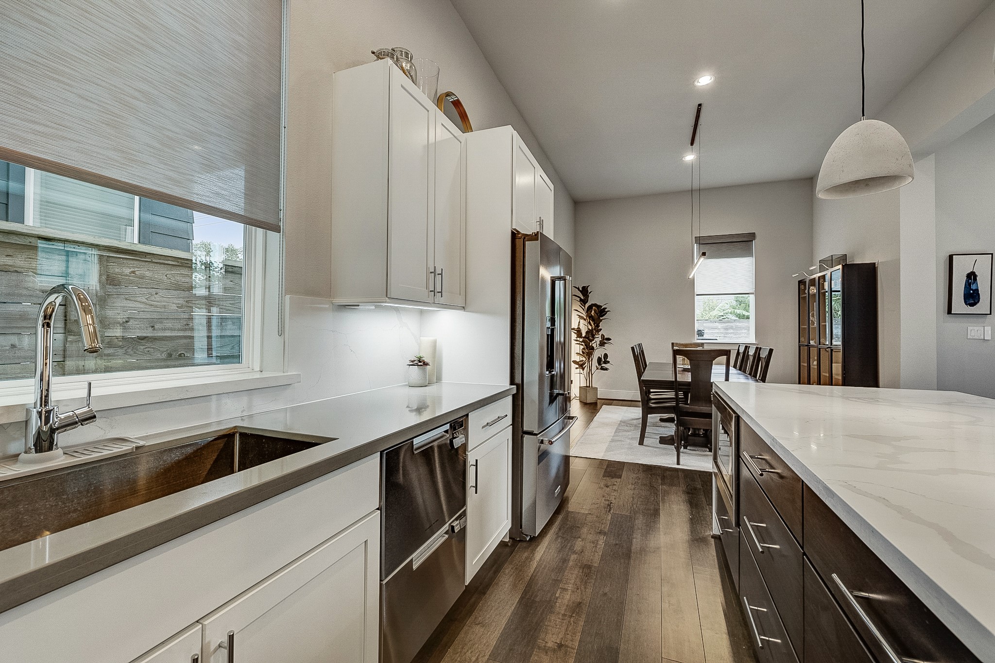 3306 Cardinal Crest Lane Houston, TX 77080 - Photo 21 of 50 a kitchen with counter top space a sink cabinets and stainless steel appliances
