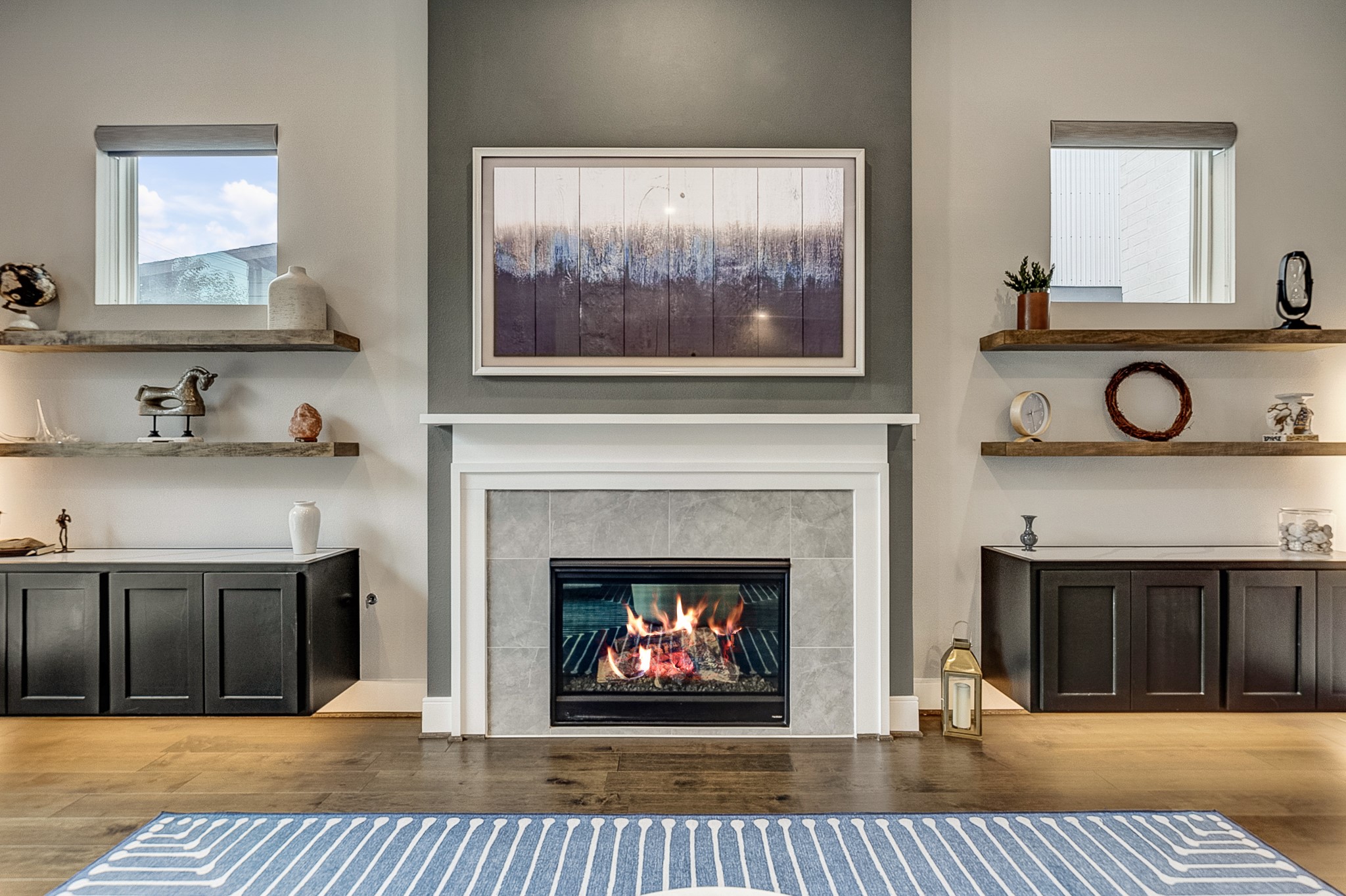 3306 Cardinal Crest Lane Houston, TX 77080 - Photo 24 of 50 a living room with furniture a fireplace and a flat screen tv