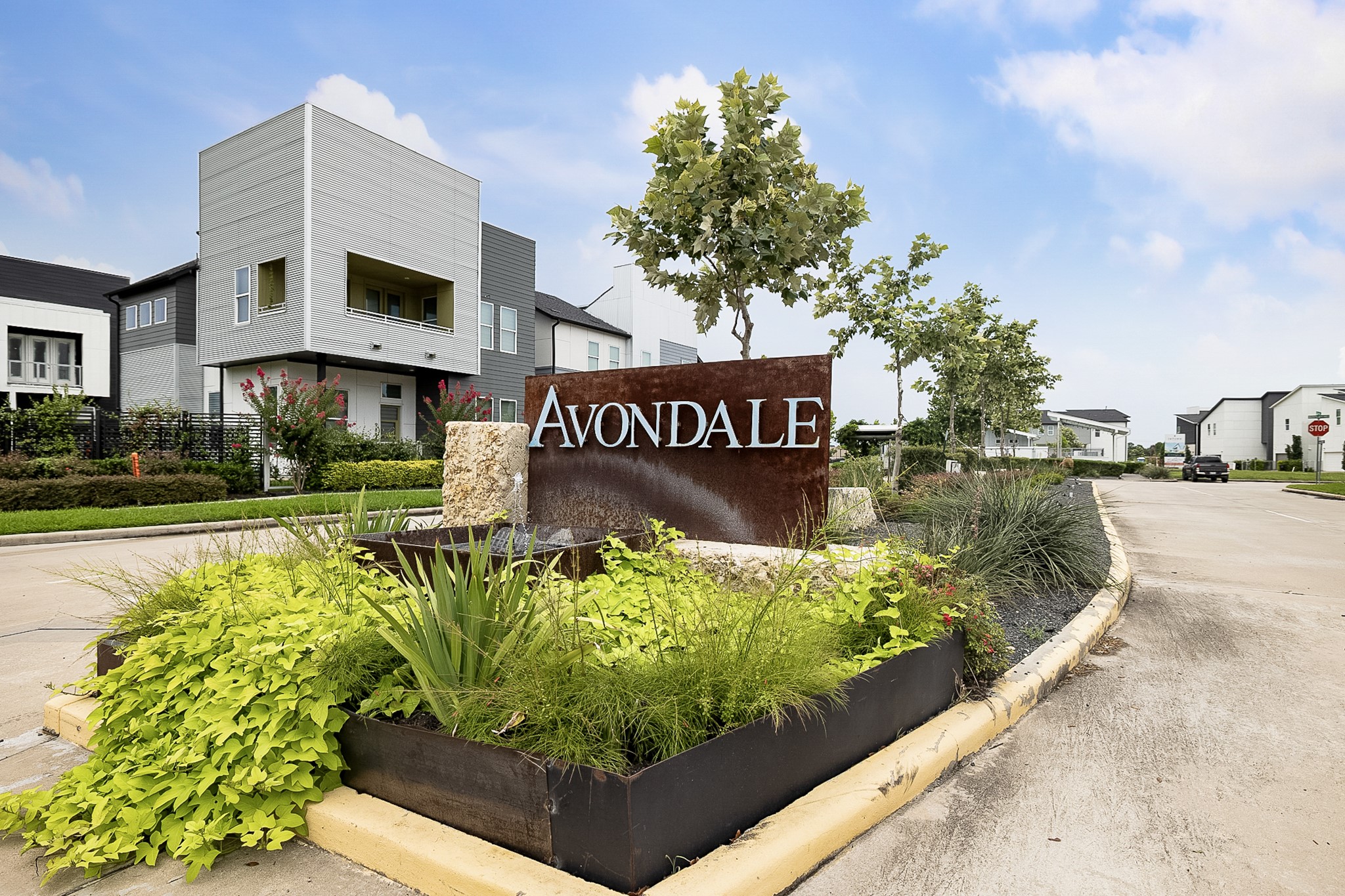 3306 Cardinal Crest Lane Houston, TX 77080 - Photo 4 of 50 a view of a sign board with buildings in the background