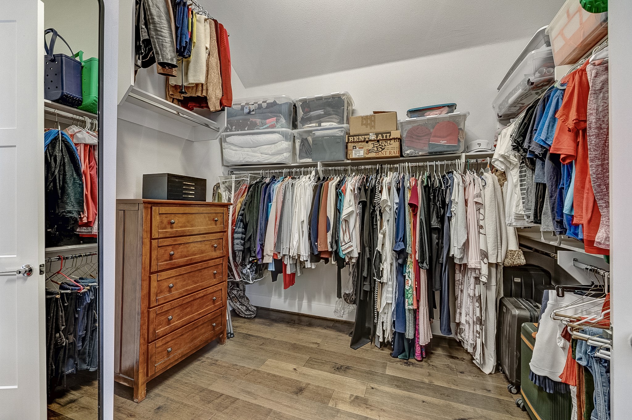 3306 Cardinal Crest Lane Houston, TX 77080 - Photo 45 of 50 a view of walk in closet with clothes and shoes