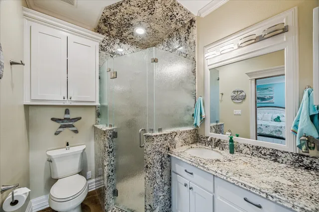 a living room with stainless steel appliances kitchen island granite countertop furniture and a kitchen view