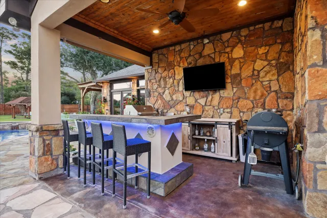 a view of a terrace with sitting area