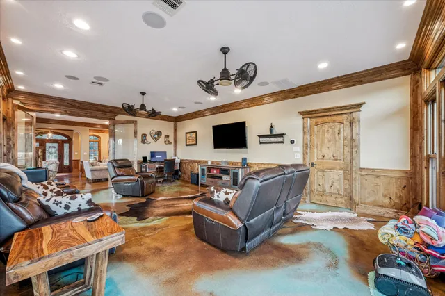 a kitchen with a table and chairs in it