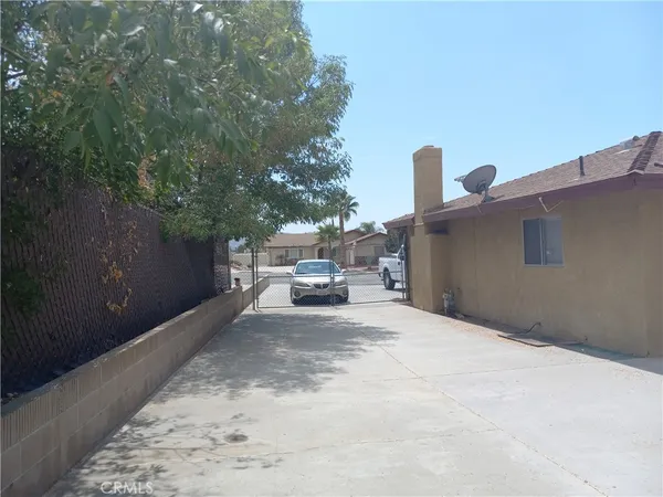 a view of a back yard of the house