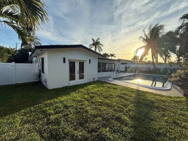 a view of a backyard with a garden