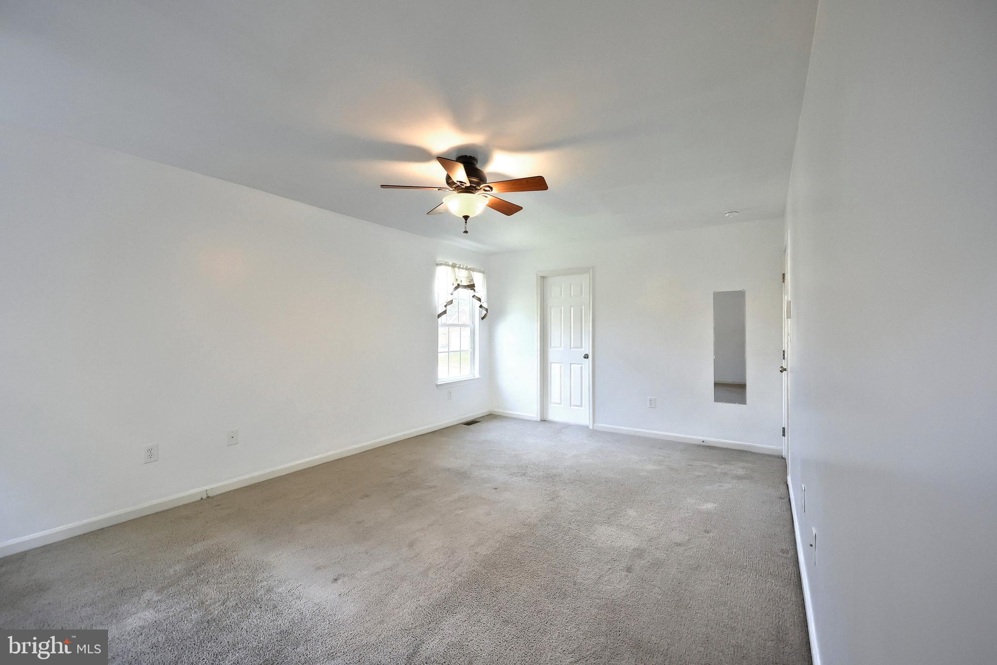 425 Lakeview Drive Spring Grove, PA 17362 - Photo 38 of 51 a view of an empty room with a window