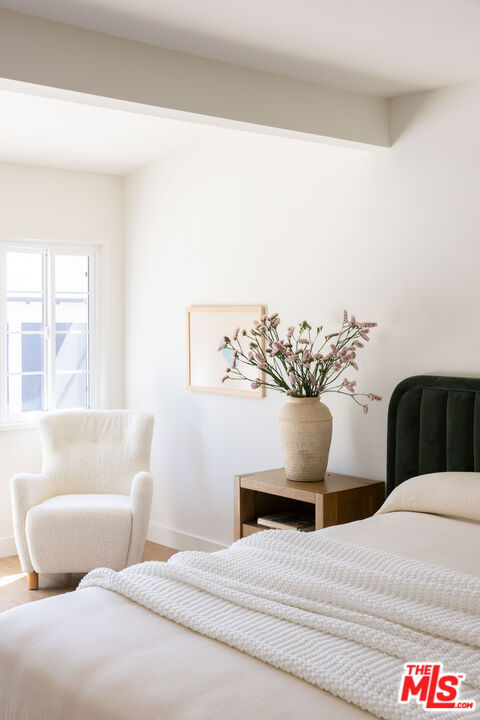 1410 Norton Avenue Glendale, CA 91202 - Photo 11 of 20 a bedroom with a bed and window