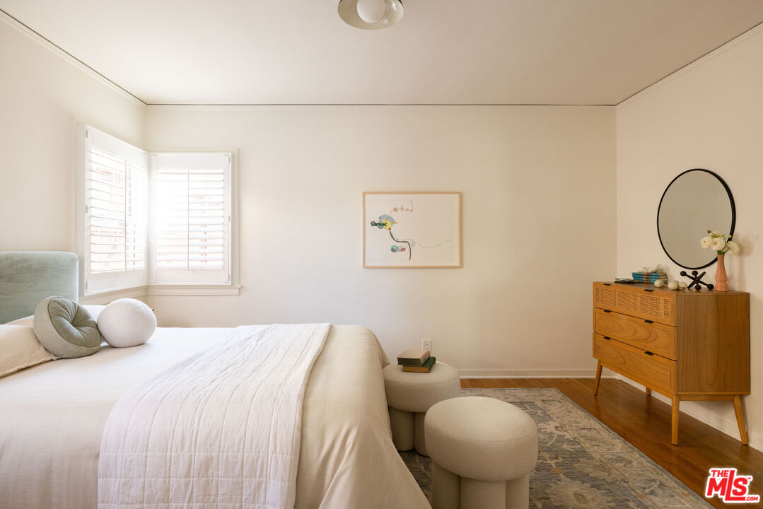 1410 Norton Avenue Glendale, CA 91202 - Photo 14 of 20 a bedroom with a bed and dresser