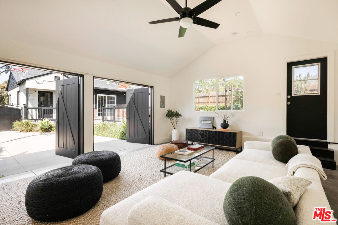 1410 Norton Avenue Glendale, CA 91202 - Photo 17 of 20 a bedroom with furniture and a large window