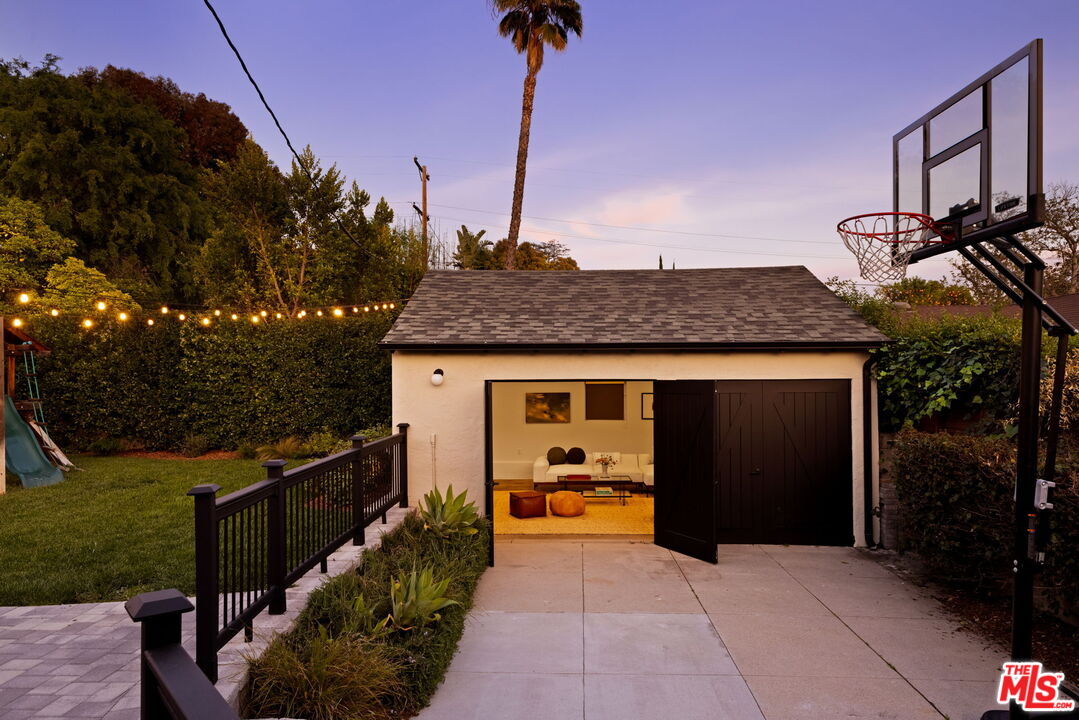 1410 Norton Avenue Glendale, CA 91202 - Photo 18 of 20 a view of a house with a backyard and a tub