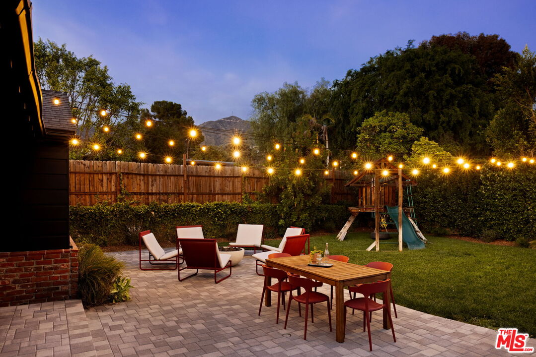 1410 Norton Avenue Glendale, CA 91202 - Photo 19 of 20 a backyard of a house with table and chairs