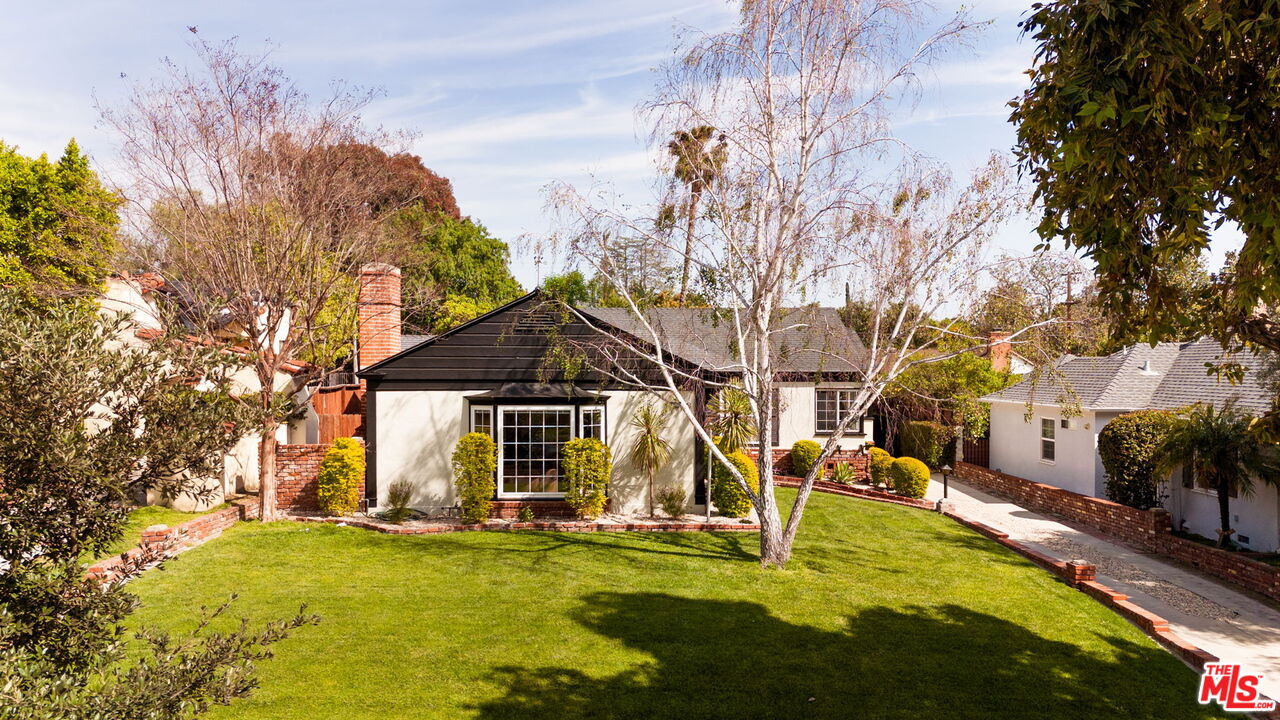 1410 Norton Avenue Glendale, CA 91202 - Photo 20 of 20 a view of a house with swimming pool and sitting area
