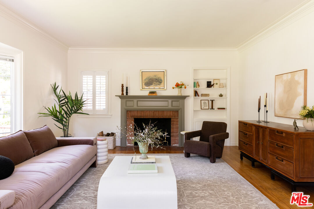 1410 Norton Avenue Glendale, CA 91202 - Photo 2 of 20 a living room with furniture and a fireplace