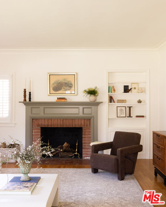 1410 Norton Avenue Glendale, CA 91202 - Photo 3 of 20 a living room with furniture and a fireplace
