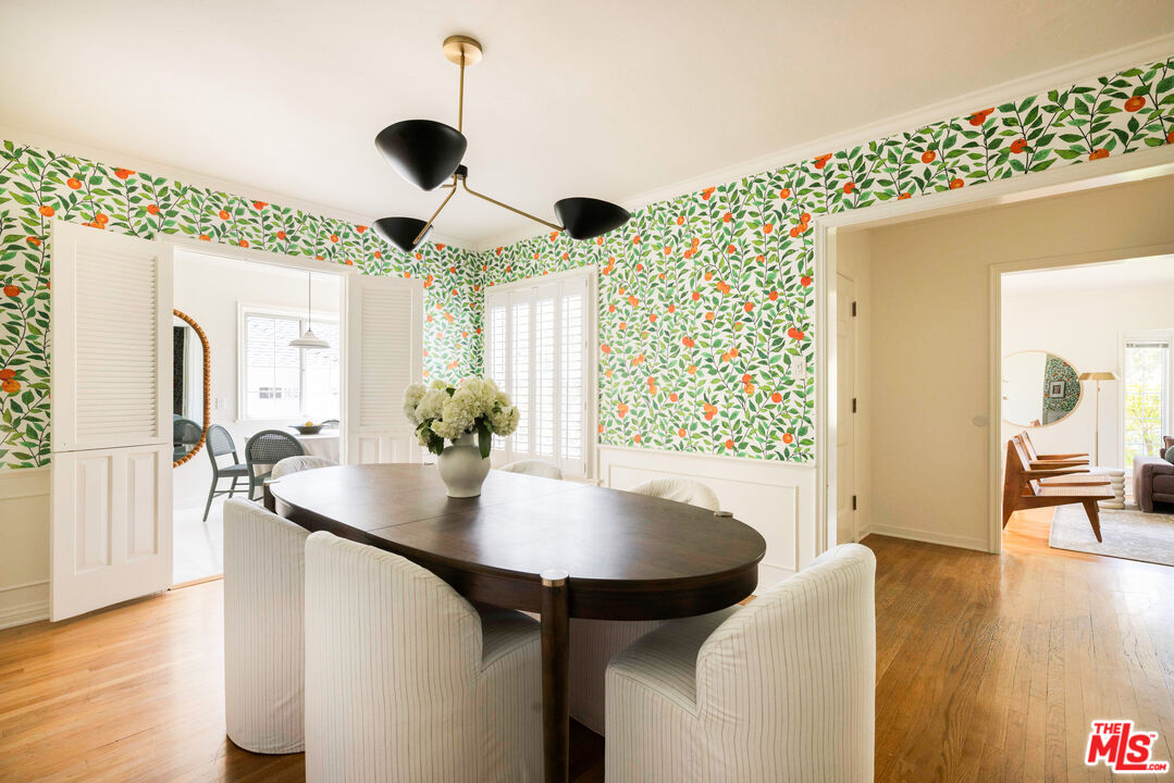 1410 Norton Avenue Glendale, CA 91202 - Photo 5 of 20 a dining room with furniture and wooden floor