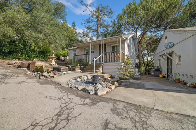 a view of a backyard with a patio
