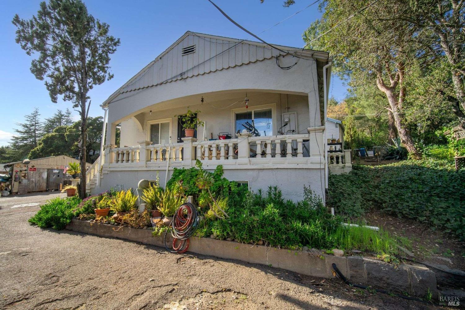 3160 Sunridge Drive Santa Rosa, CA 95404 - Photo 21 of 45 a view of a house with a small yard and potted plants