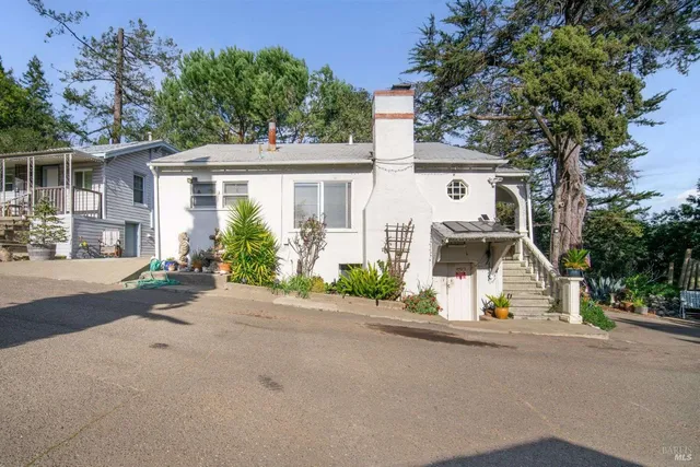 front view of a house with a street