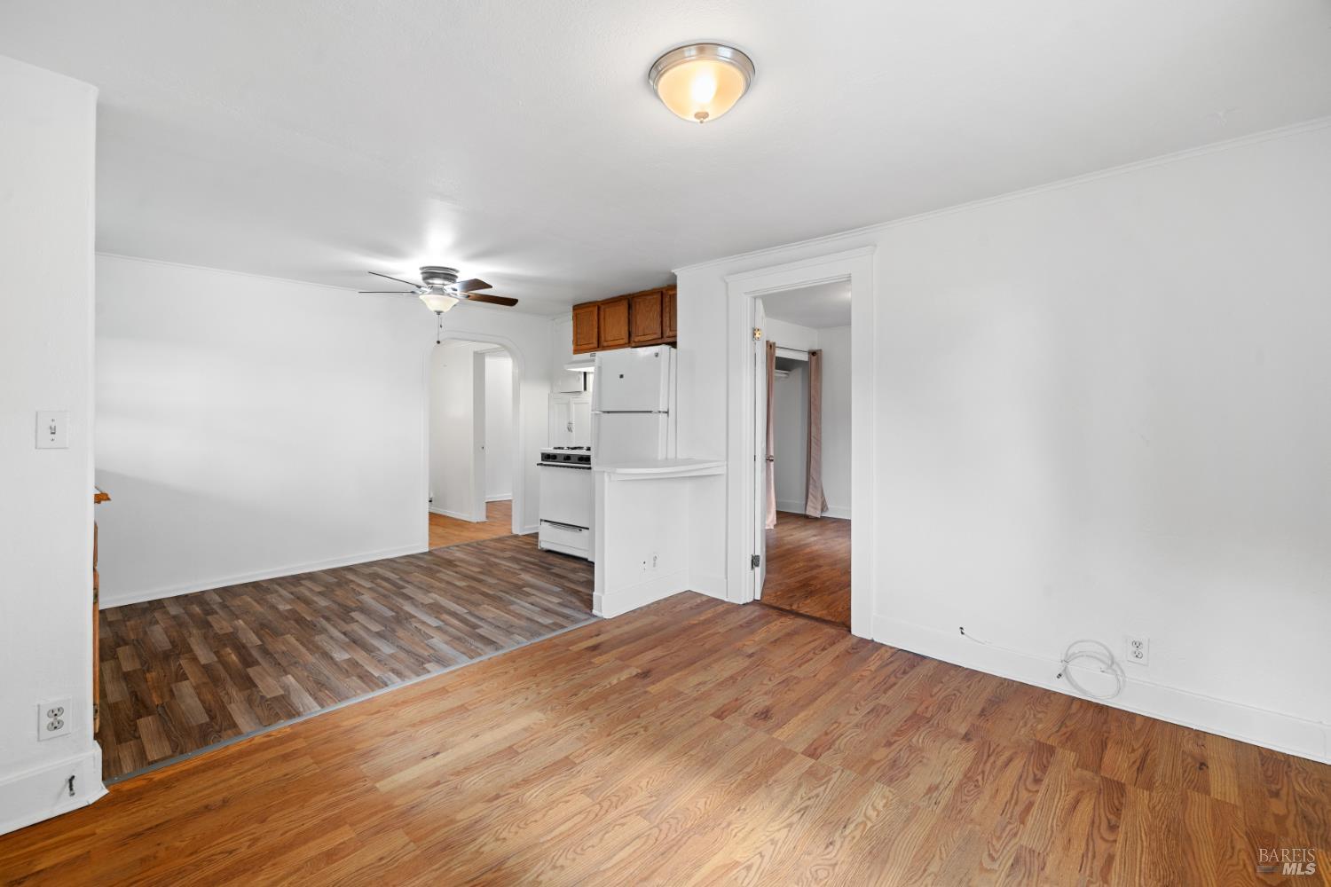 3160 Sunridge Drive Santa Rosa, CA 95404 - Photo 5 of 45 a bedroom with a bed and a chandelier