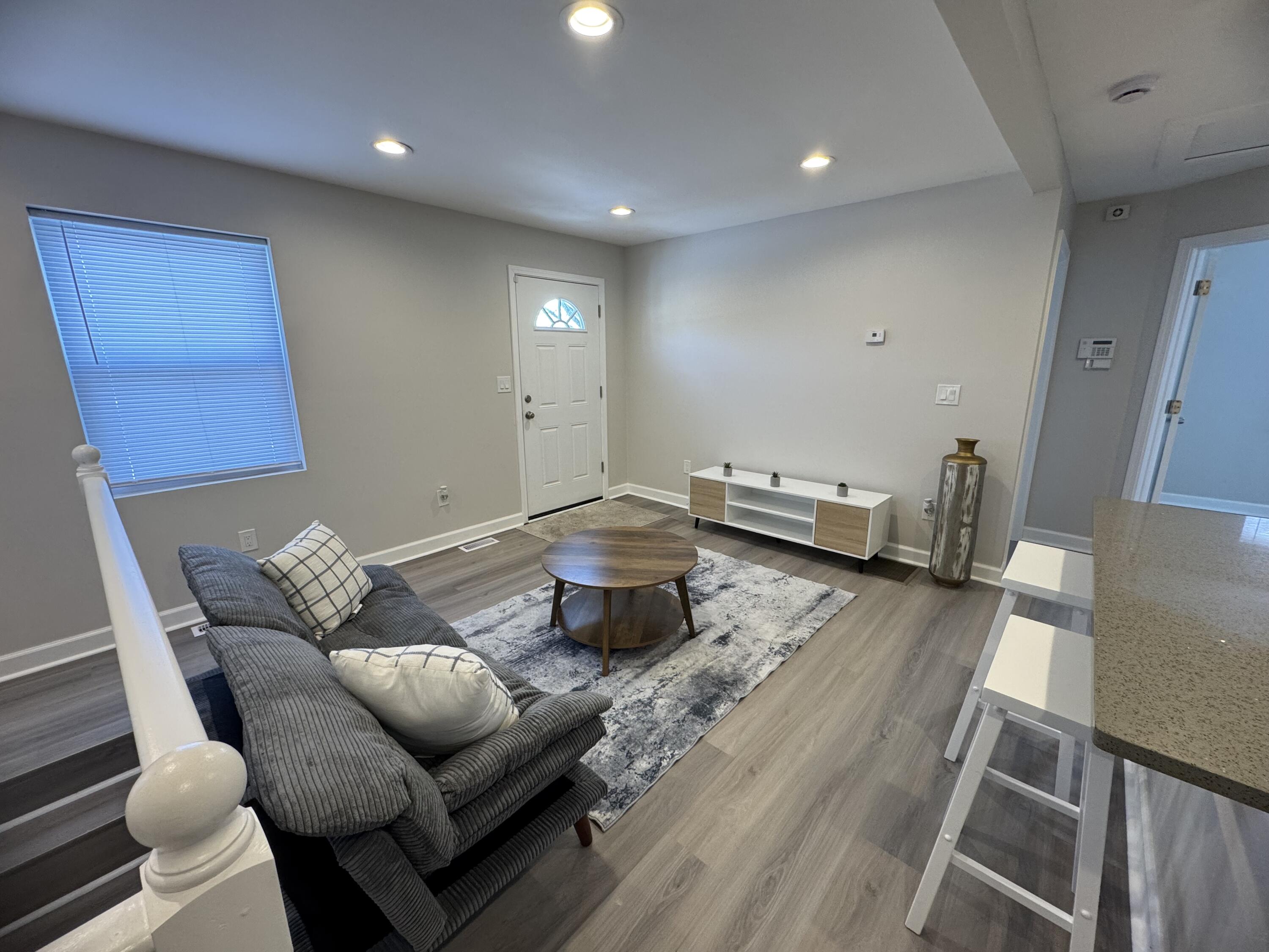 2344 Virginia Street Gary, IN 46407 - Photo 13 of 13 a living room with furniture and a wooden floor