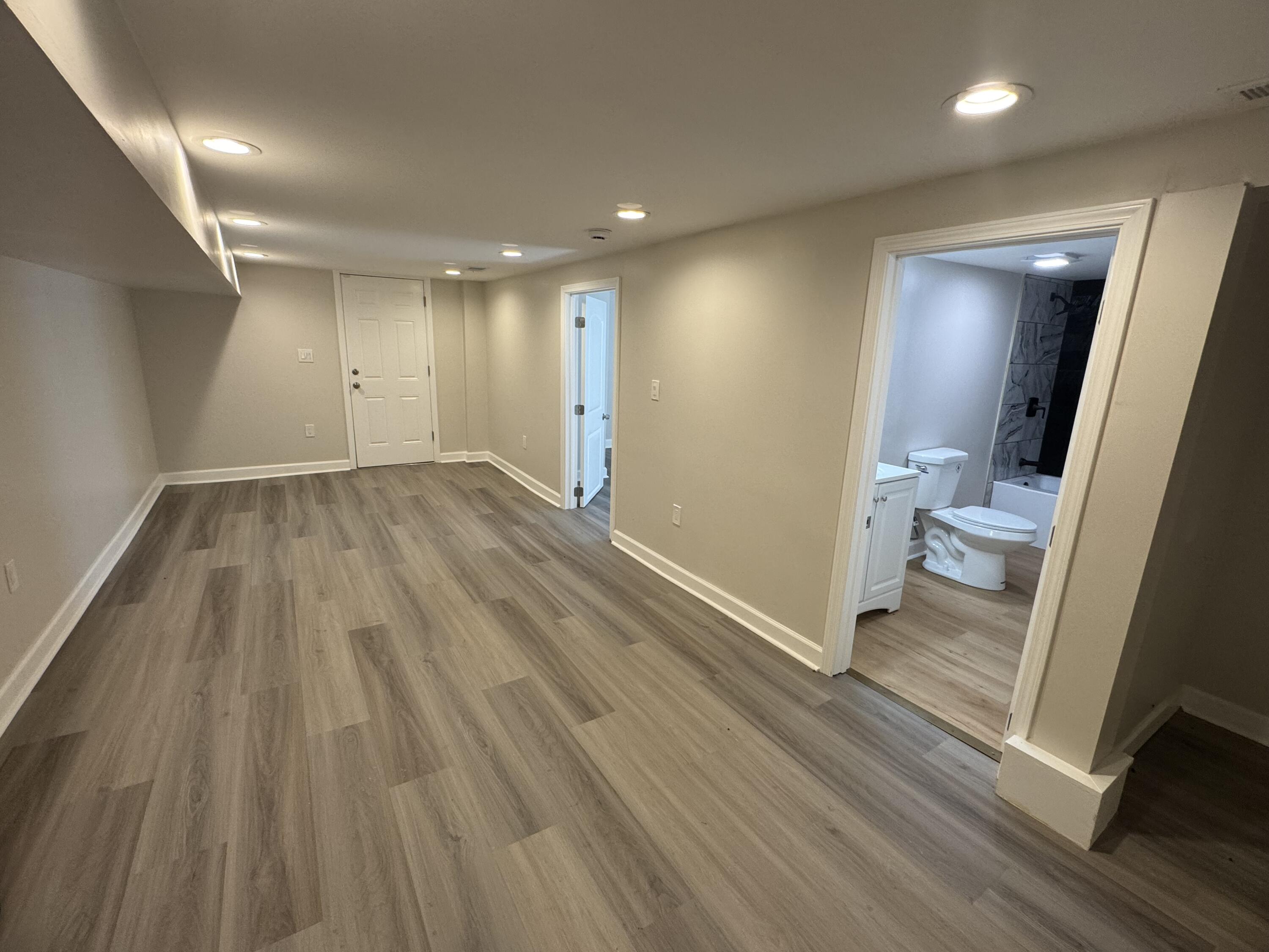 2344 Virginia Street Gary, IN 46407 - Photo 8 of 13 wooden floor in an empty room with a window
