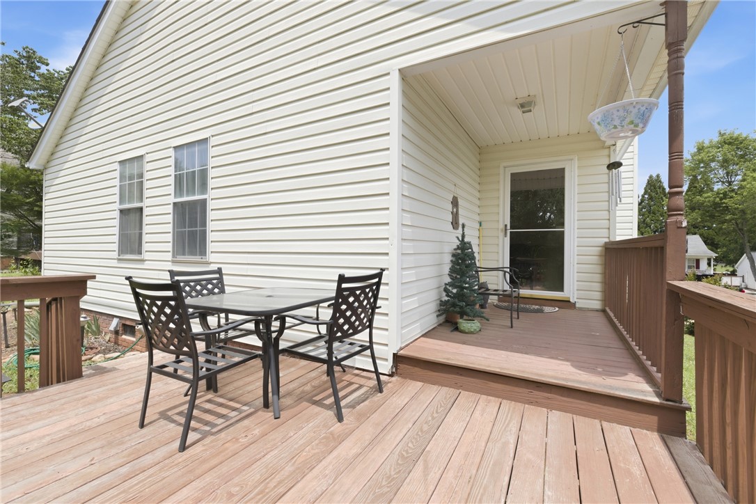 128 Kelly Lane Easley, SC 29642 - Photo 5 of 23 A spacious wooden deck provides ample room for outdoor relaxation and entertainment.