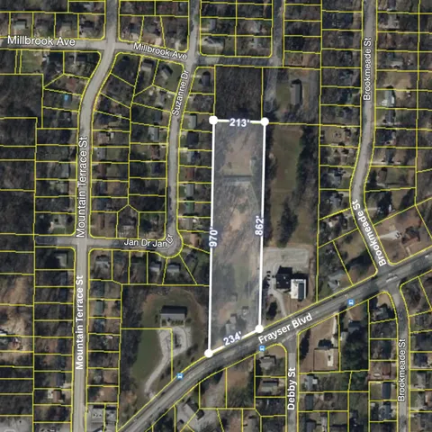 a bathroom with a shower and a glass door