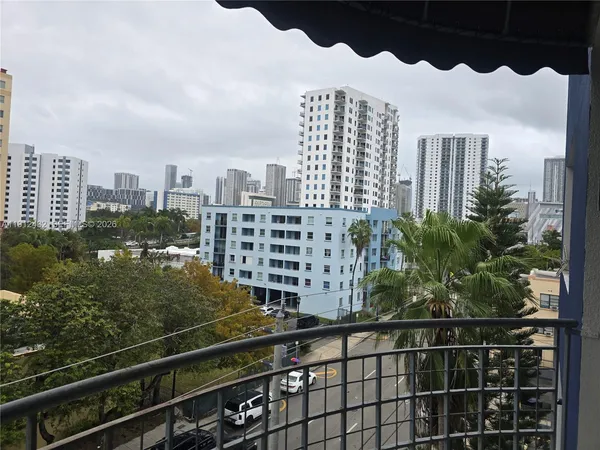 a view of a city with tall buildings