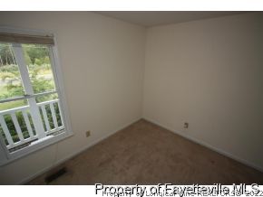 1890 Tingen Road Lillington, NC 27546 - Photo 8 of 12 a view of an empty room