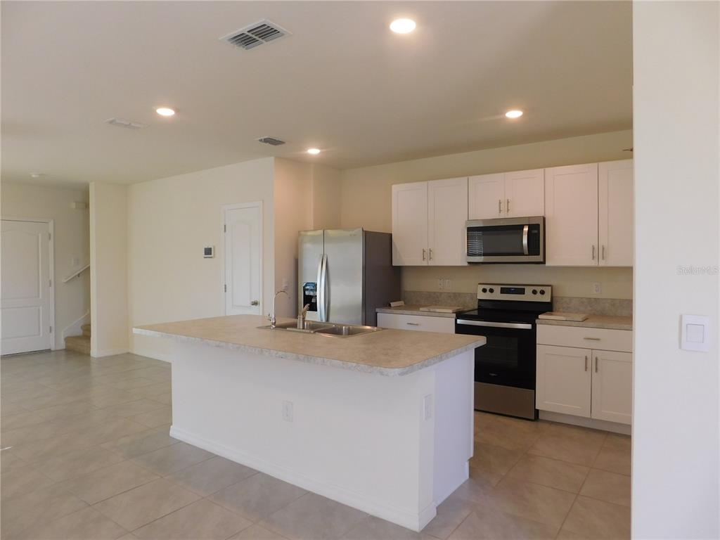 1587 Candlefire Row Kissimmee, FL 34744 - Photo 7 of 51