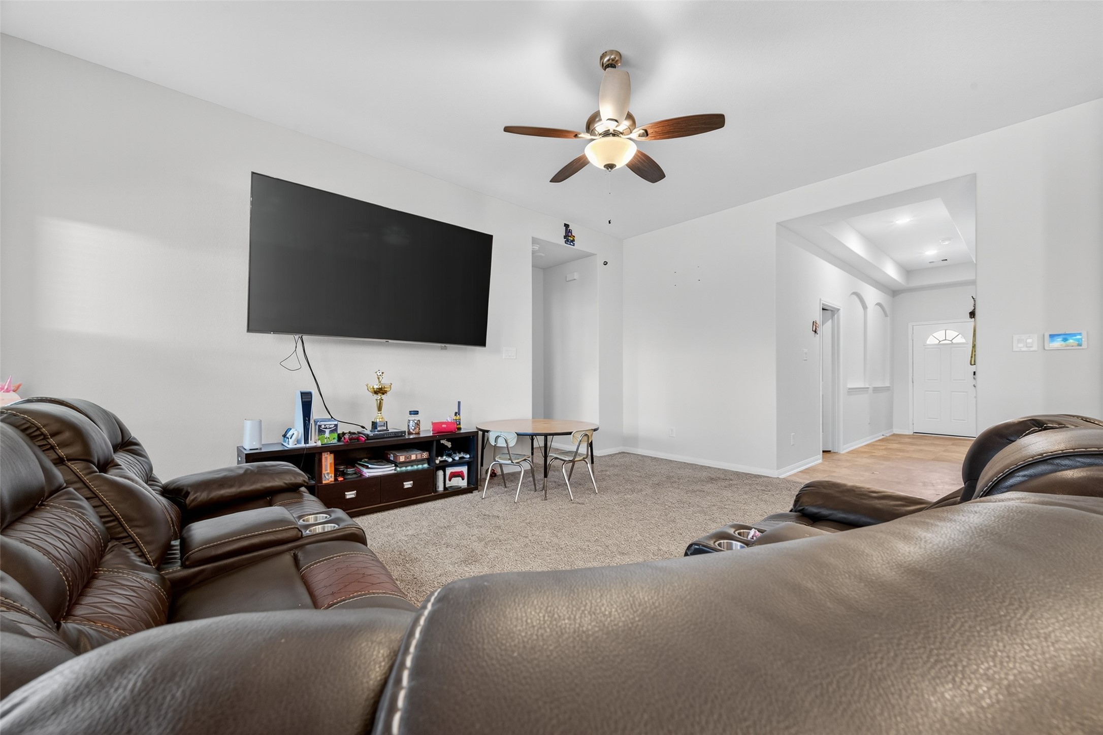 7615 Nevaeh Crest Path Houston, TX 77016 - Photo 11 of 37 a living room with furniture and a flat screen tv