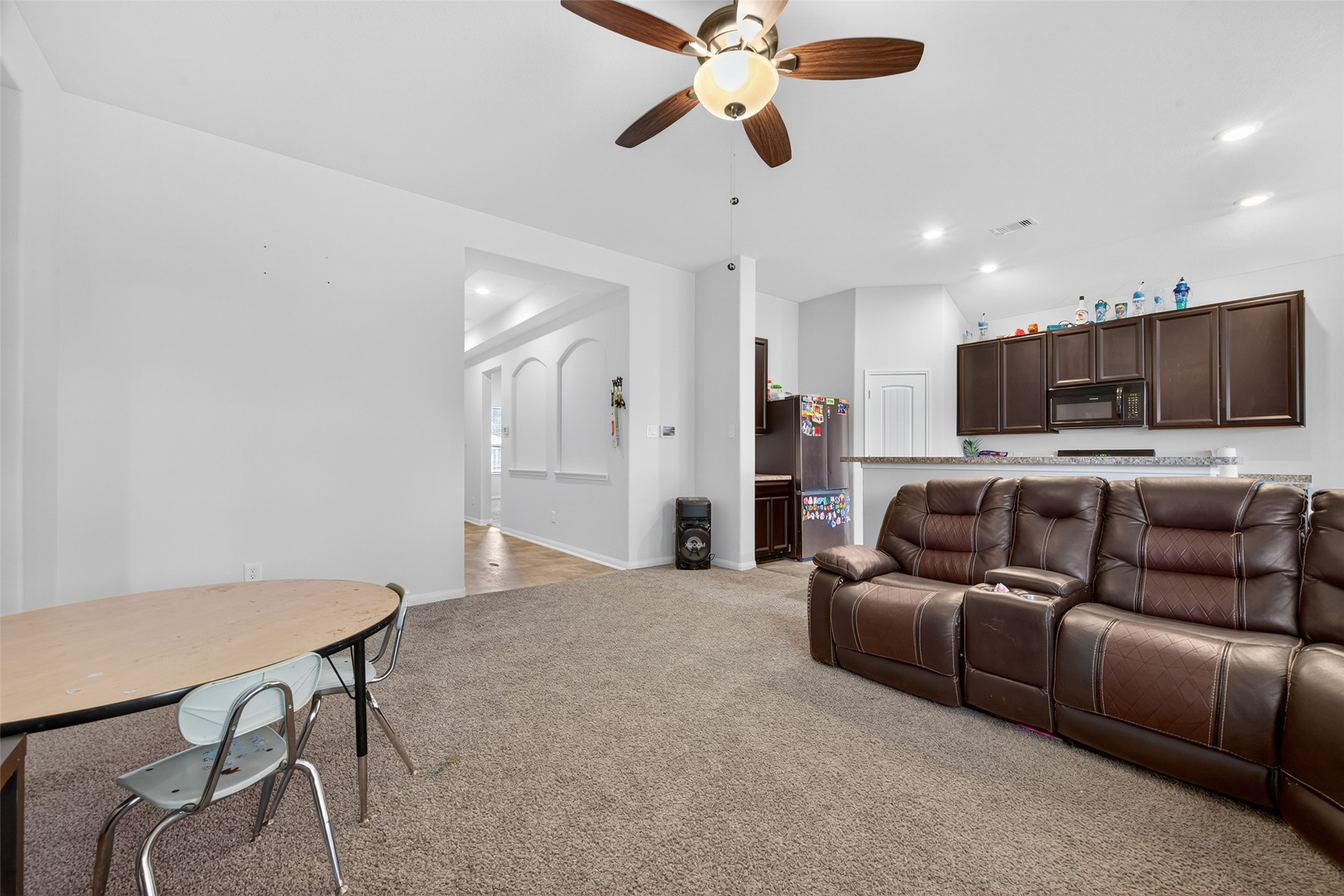 7615 Nevaeh Crest Path Houston, TX 77016 - Photo 12 of 37 a living room with furniture and a flat screen tv