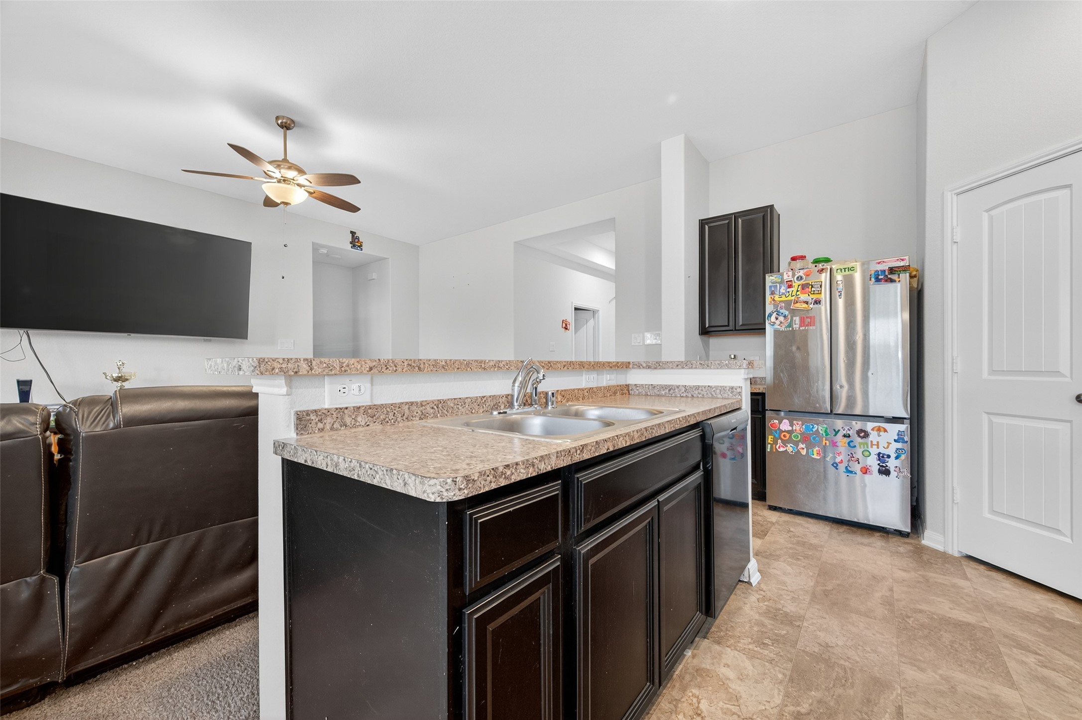 7615 Nevaeh Crest Path Houston, TX 77016 - Photo 20 of 37 a kitchen with a appliances and a refrigerator