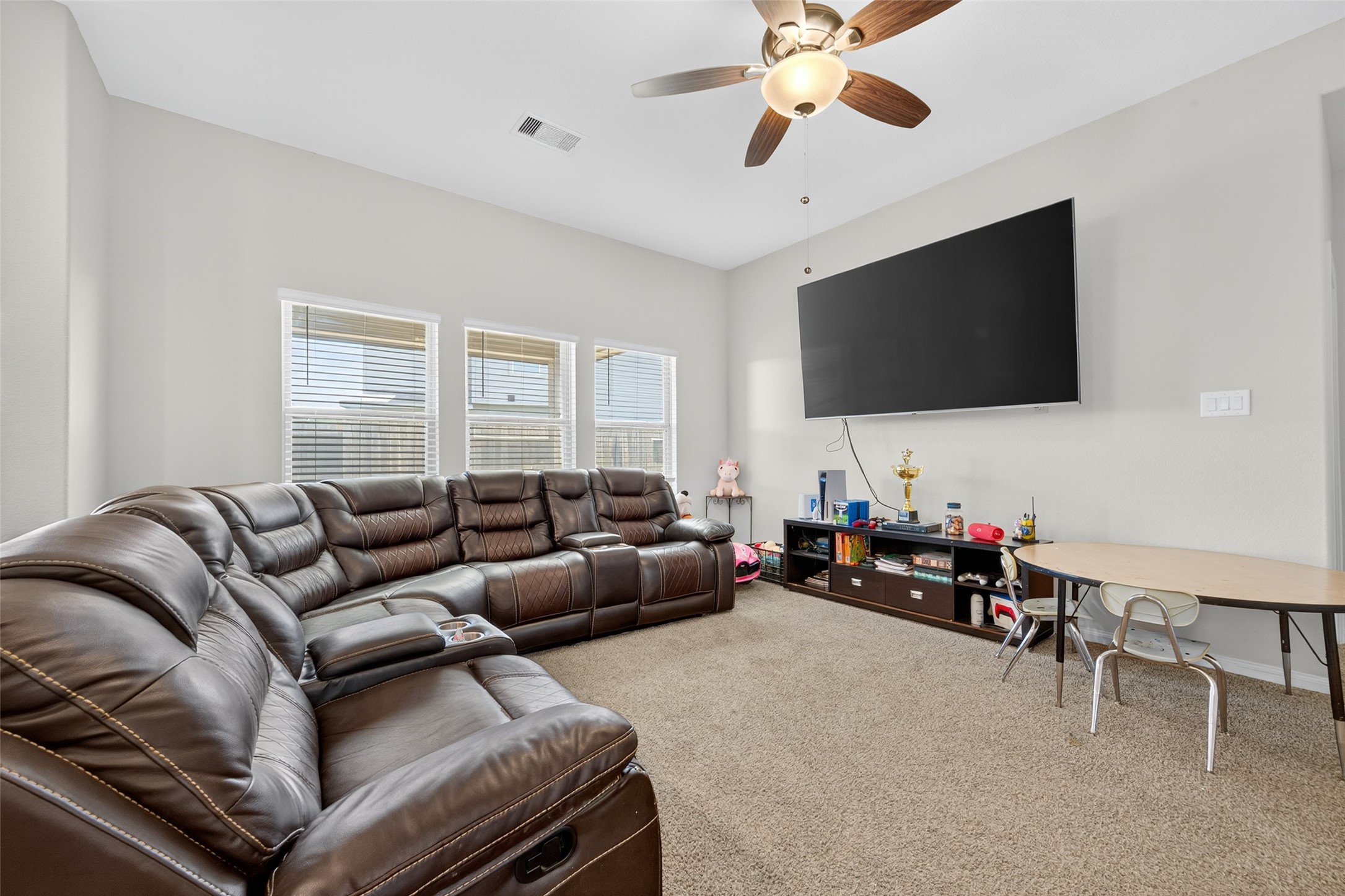 7615 Nevaeh Crest Path Houston, TX 77016 - Photo 10 of 37 a living room with furniture and a flat screen tv
