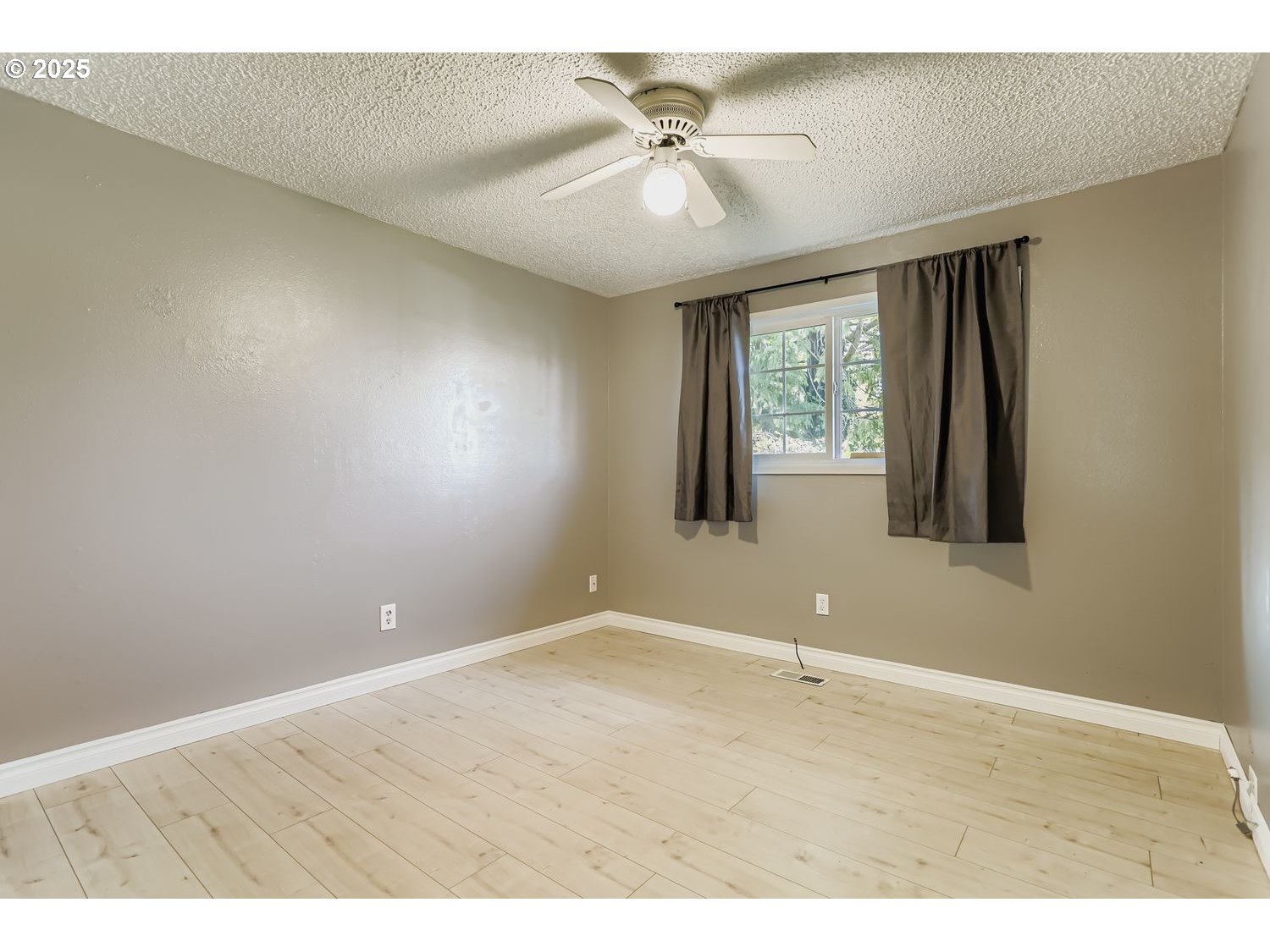 120 Northwest Giese Avenue Gresham, OR 97030 - Photo 11 of 17 a view of an empty room with a window