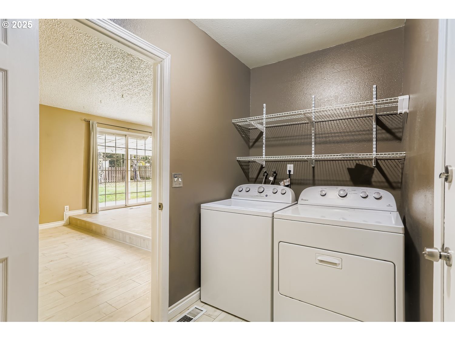120 Northwest Giese Avenue Gresham, OR 97030 - Photo 14 of 17 a view of storage and utility room with washer and dryer