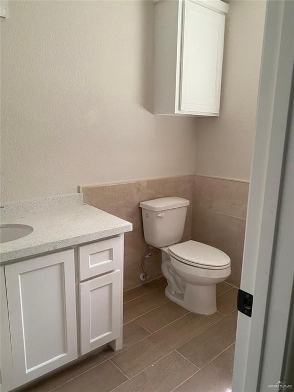 2114 Monterrey Hidalgo, TX 78557 - Photo 14 of 17 a white toilet sitting next to a white sink