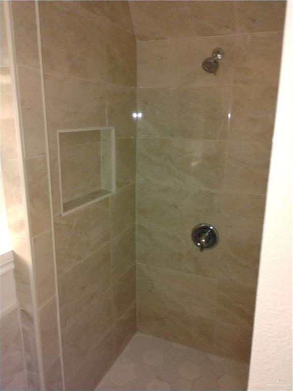 2114 Monterrey Hidalgo, TX 78557 - Photo 15 of 17 a bathroom with a shower