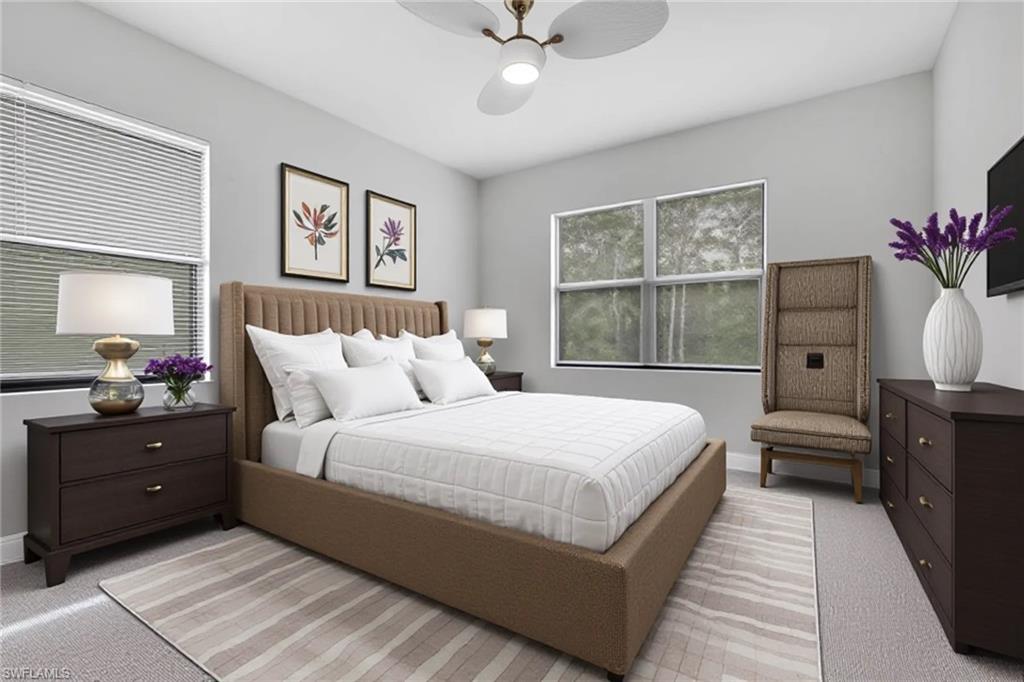 7501 Carnegie Way Naples, FL 34119 - Photo 17 of 37 Carpeted bedroom featuring a ceiling fan and baseboards