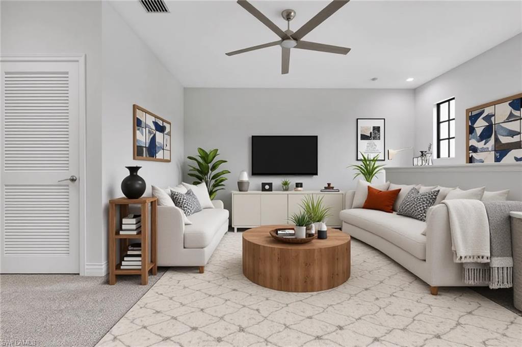 7501 Carnegie Way Naples, FL 34119 - Photo 25 of 37 Living room featuring light colored carpet, ceiling fan, and recessed lighting