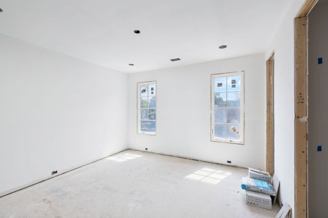 an empty room with windows